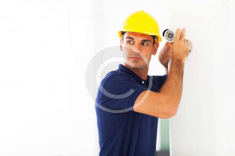 Cctv Technician Adjusting Camera Middlesex